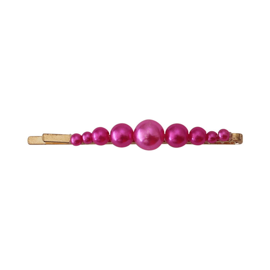 Hårspænder med perler i forskellige farver.