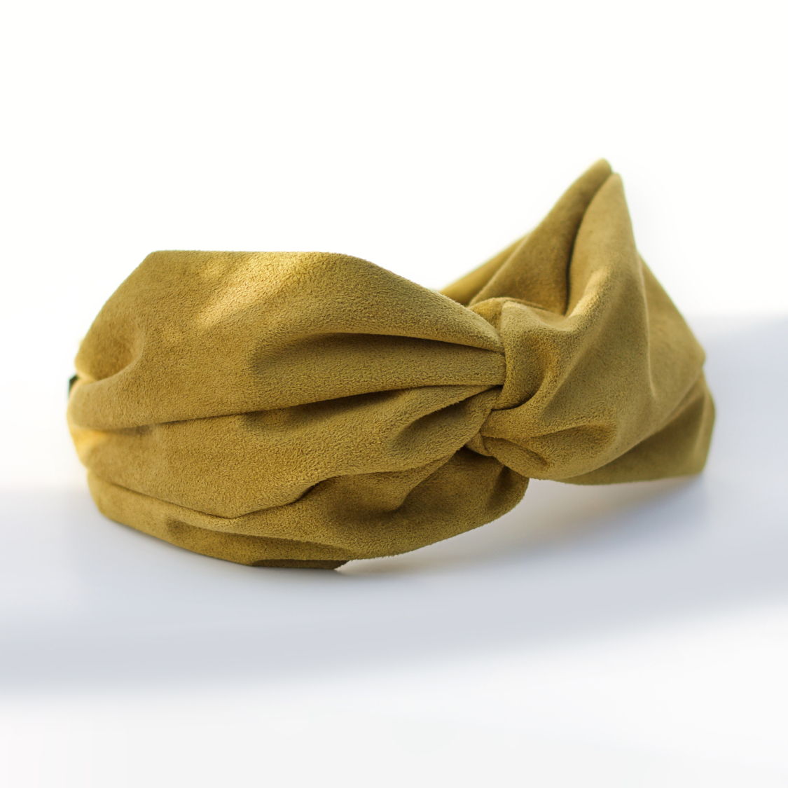 sullivan hårbånd i karry ruskind  fra le mosch