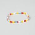 Xia armbånd i gule og røde nuancer fra le mosch