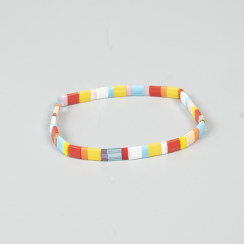 Xia armbånd i gule og røde nuancer fra le mosch Xia armbånd i gule og røde nuancer fra le mosch