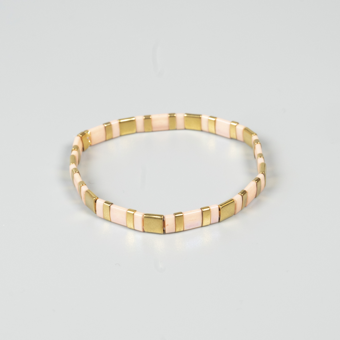 Xia armbånd i guld og pudder fra lemosch