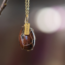 Krystal æg i Obsidian Mahogni 3x2 cm fra le mosch Krystal æg i Obsidian Mahogni 3x2 cm fra le mosch