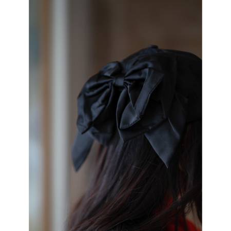 Marissa Cap med sløjfe i Sort fra le mosch