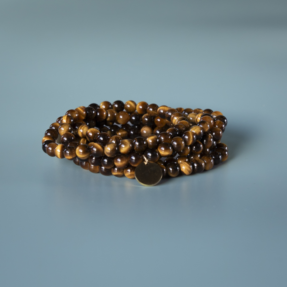 Haniel armbånd Tigerøje natursten 6mm fra le mosch