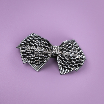 Bellina sløjfe-hårspænde med similisten i Sort fra le mosch