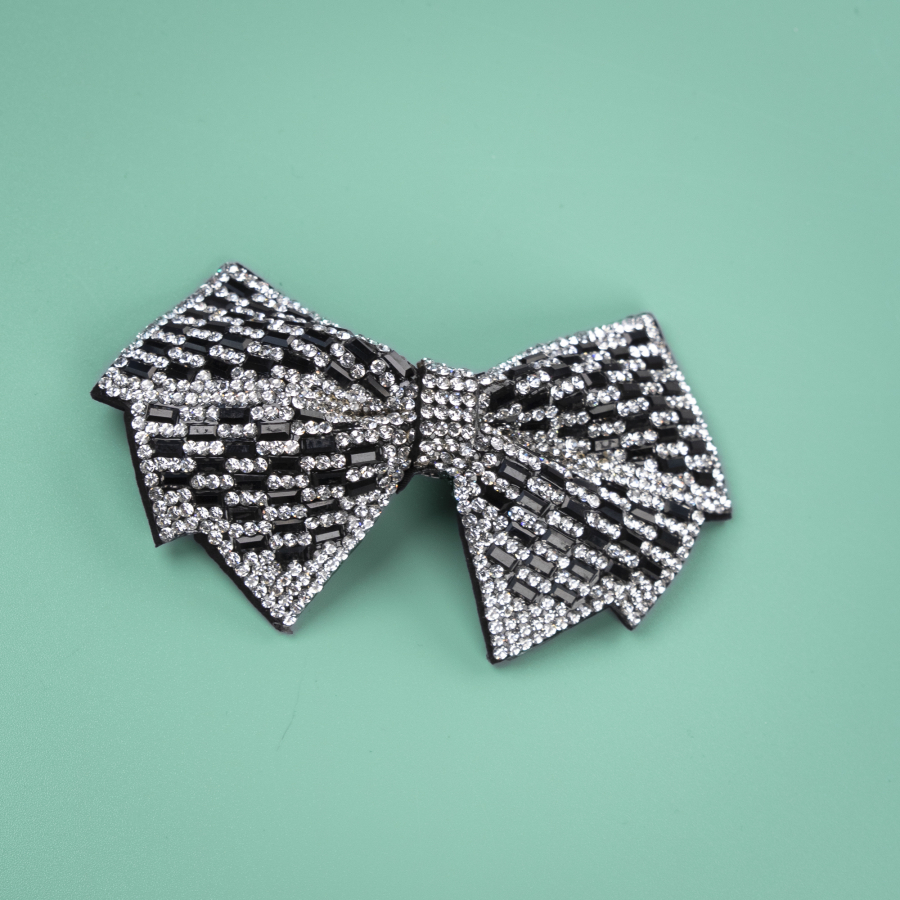 Bellina sløjfe-hårspænde med similisten i Sølv fra le mosch