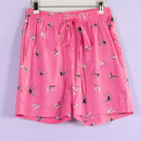 Lyserøde shorts med print af svaler Lyserøde shorts med print af svaler