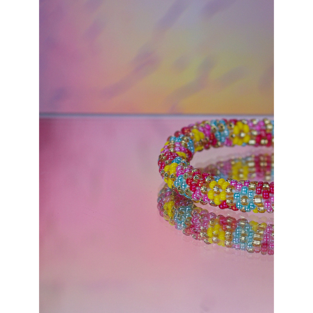Håndbroderet Nepal Armbånd med Perler i pink, rød og gul fra LE MOSCH