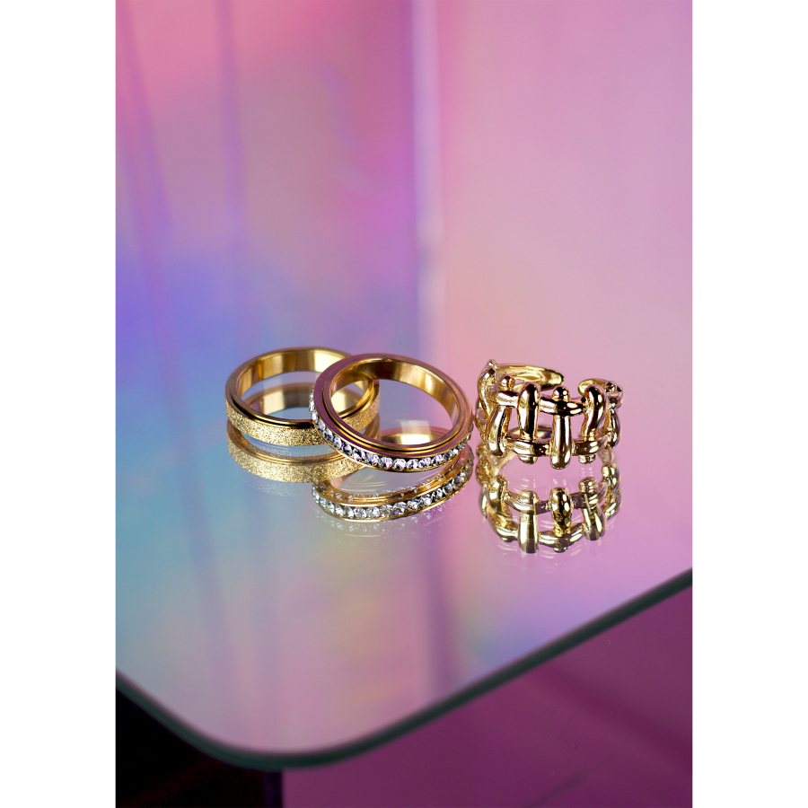 Arlette anti stress ringe sæt 6 fra LÉ MOSCH, 3 gyldne anti-stress ringe, med sten, tekstur og drejefunktion, 