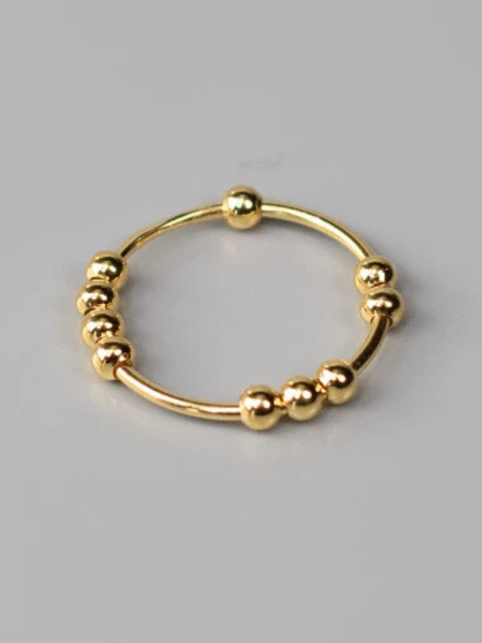 Vilje anti stress ring i blank forgyldt fra LÉ MOSCH,